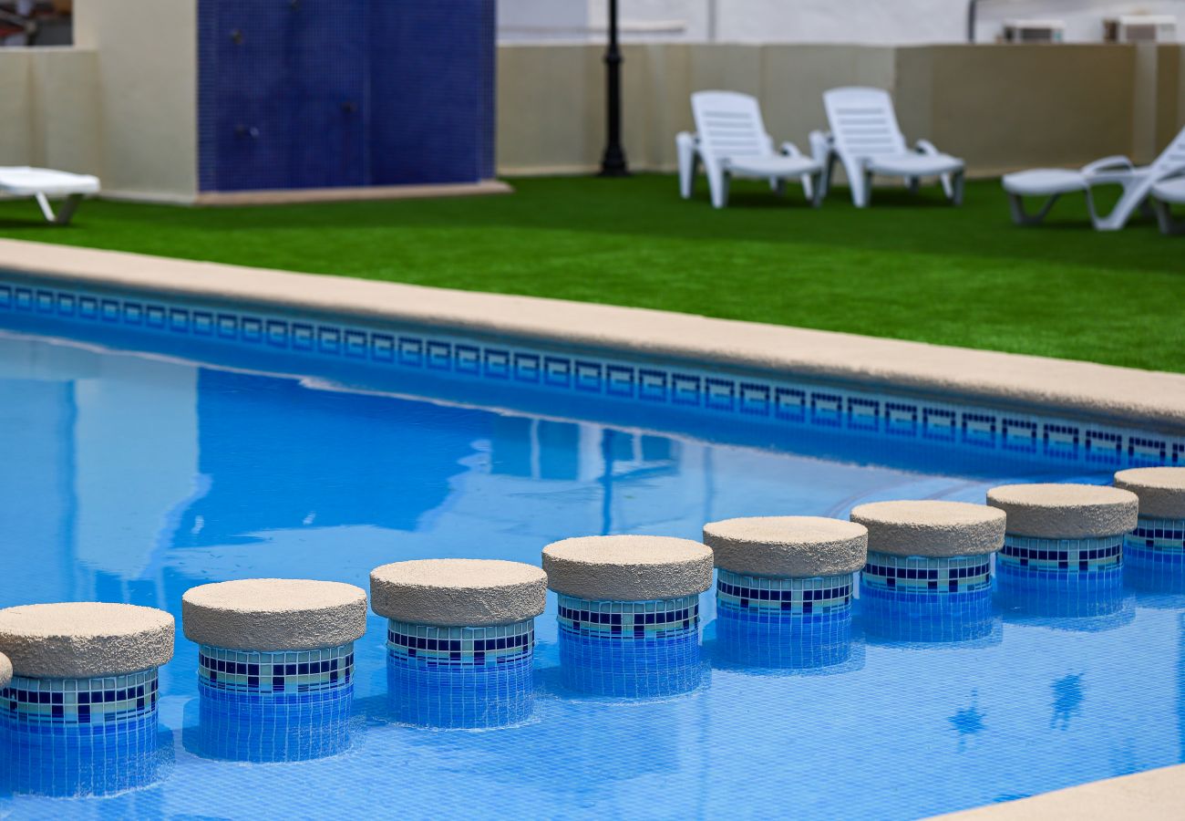 Apartamento en Playa de Gandía - Acogedor con estilo mediterráneo, a pocos metros de la playa. A/A y wifi gratis. Terraza con vistas al mar-ALQUILER SOLO FAMILIAS