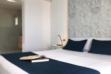 Precioso dormitorio con baño en suite en villa vacacional