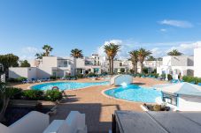 Apartamento en Corralejo - HomeForGuest Apartamento 1 con terraza y piscina en Corralejo