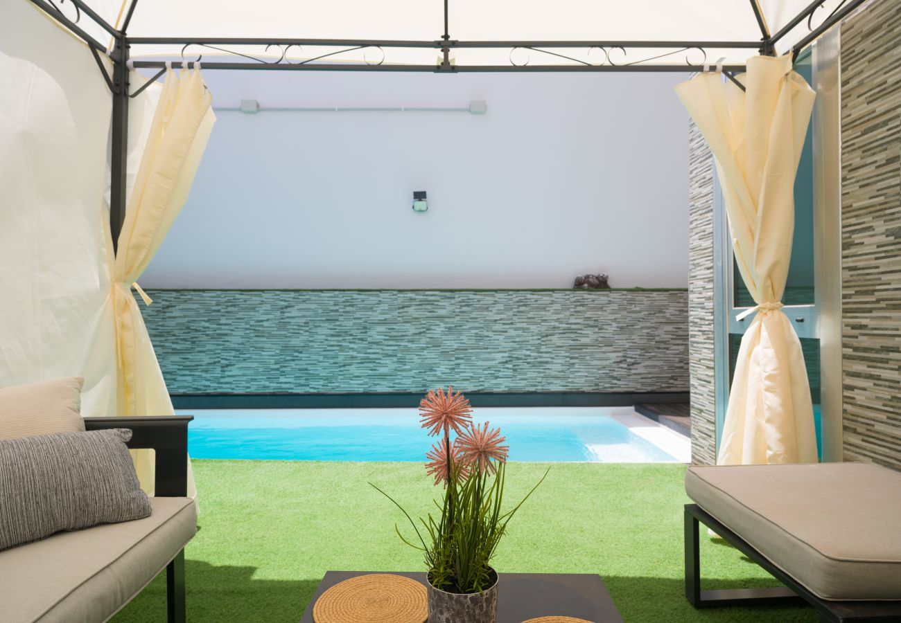 Casa adosada en Telde - Adosado en Telde con piscina y vistas al mar