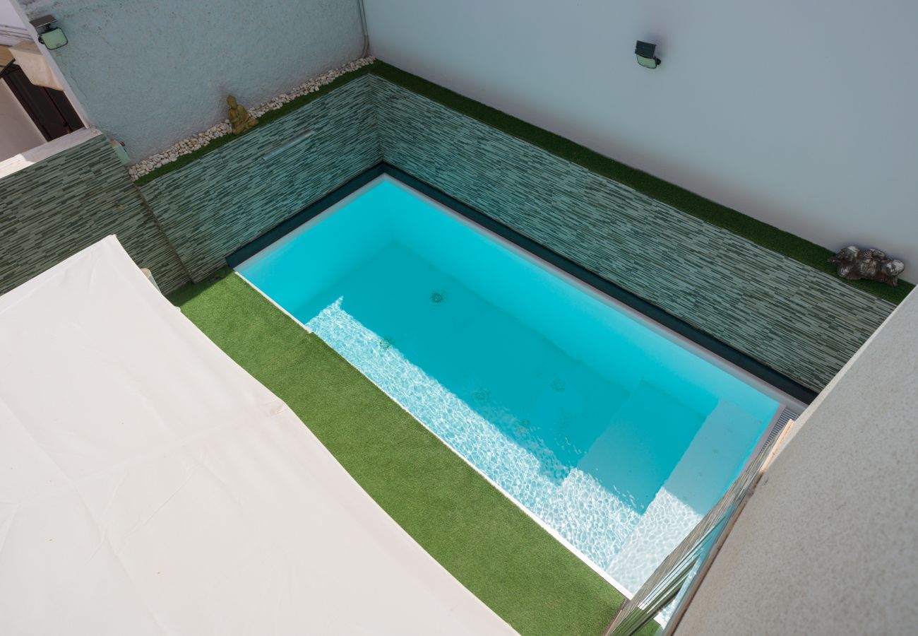 Casa adosada en Telde - Adosado en Telde con piscina y vistas al mar