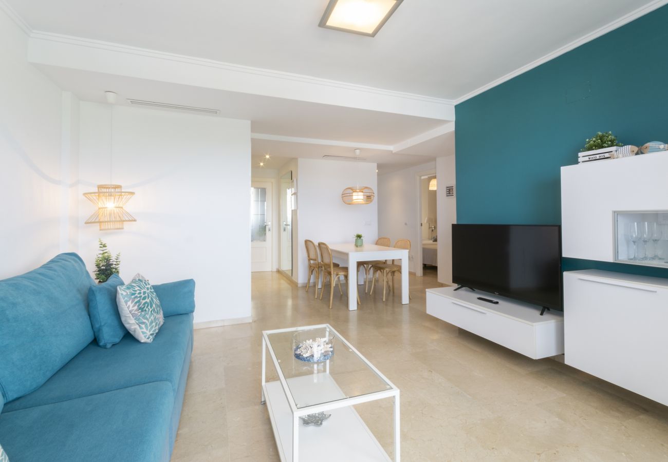Apartment in Playa de Gandía - Decorated in modern style, with wifi free, International channels, BBQ, children's area, 