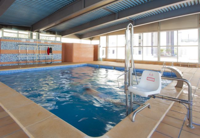 Apartment in Playa de Gandía - Amazing modern style condo, wifi free, interantional channels, heating swimming pool, children's area, BBQ Apartment in Playa de Gandía - Amazing modern style condo, wifi free, interantional channels, heating swimming pool, children's area, BBQ