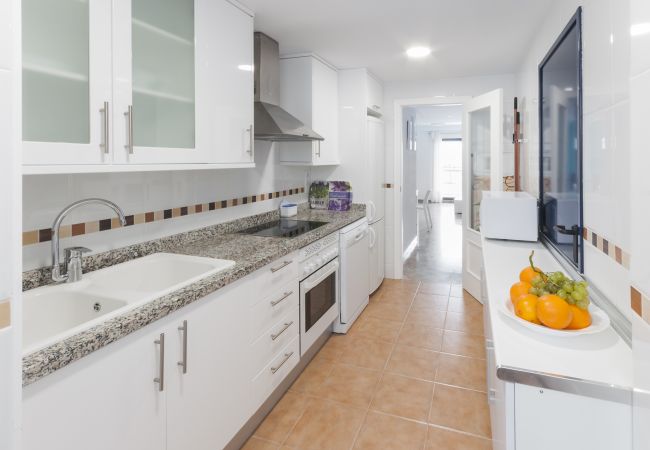Apartment in Playa de Gandía - Amazing modern style condo, wifi free, interantional channels, heating swimming pool, children's area, BBQ Apartment in Playa de Gandía - Amazing modern style condo, wifi free, interantional channels, heating swimming pool, children's area, BBQ