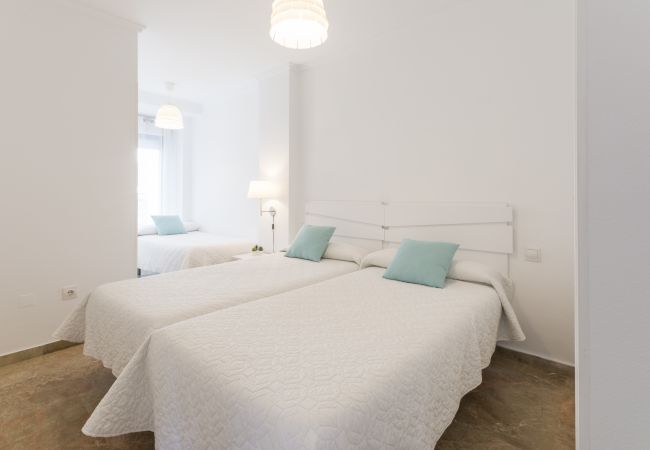 Apartment in Playa de Gandía - Amazing modern style condo, wifi free, interantional channels, heating swimming pool, children's area, BBQ Apartment in Playa de Gandía - Amazing modern style condo, wifi free, interantional channels, heating swimming pool, children's area, BBQ