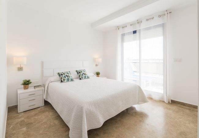 Apartment in Playa de Gandía - Amazing modern style condo, wifi free, interantional channels, heating swimming pool, children's area, BBQ Apartment in Playa de Gandía - Amazing modern style condo, wifi free, interantional channels, heating swimming pool, children's area, BBQ