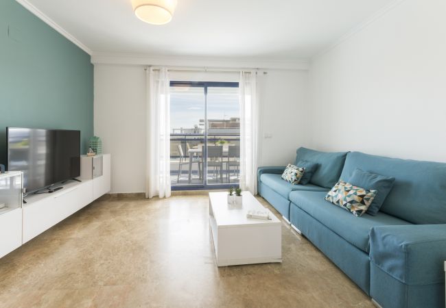Apartment in Playa de Gandía - Amazing modern style condo, wifi free, interantional channels, heating swimming pool, children's area, BBQ Apartment in Playa de Gandía - Amazing modern style condo, wifi free, interantional channels, heating swimming pool, children's area, BBQ