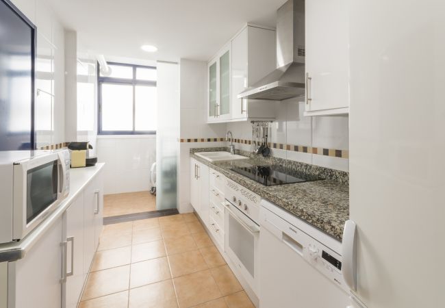 Apartment in Playa de Gandía - Amazing modern style condo, wifi free, interantional channels, heating swimming pool, children's area, BBQ Apartment in Playa de Gandía - Amazing modern style condo, wifi free, interantional channels, heating swimming pool, children's area, BBQ