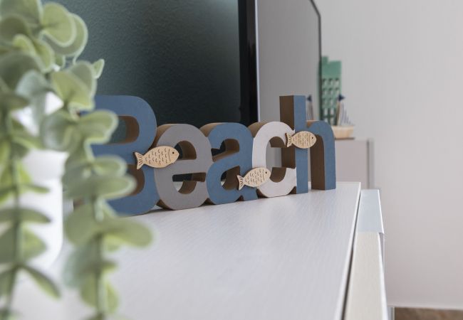 Apartment in Playa de Gandía - Amazing modern style condo, wifi free, interantional channels, heating swimming pool, children's area, BBQ Apartment in Playa de Gandía - Amazing modern style condo, wifi free, interantional channels, heating swimming pool, children's area, BBQ