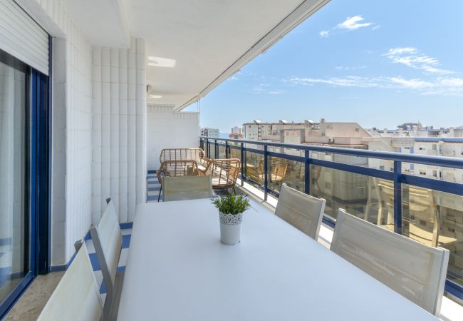 Apartment in Playa de Gandía - Amazing modern style condo, wifi free, interantional channels, heating swimming pool, children's area, BBQ Apartment in Playa de Gandía - Amazing modern style condo, wifi free, interantional channels, heating swimming pool, children's area, BBQ