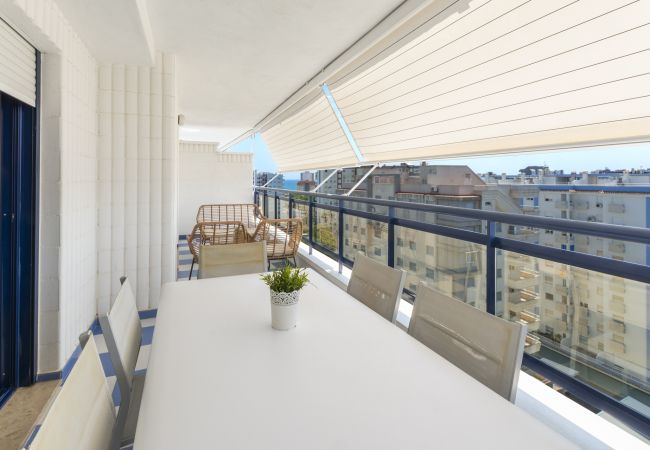 Apartment in Playa de Gandía - Amazing modern style condo, wifi free, interantional channels, heating swimming pool, children's area, BBQ Apartment in Playa de Gandía - Amazing modern style condo, wifi free, interantional channels, heating swimming pool, children's area, BBQ