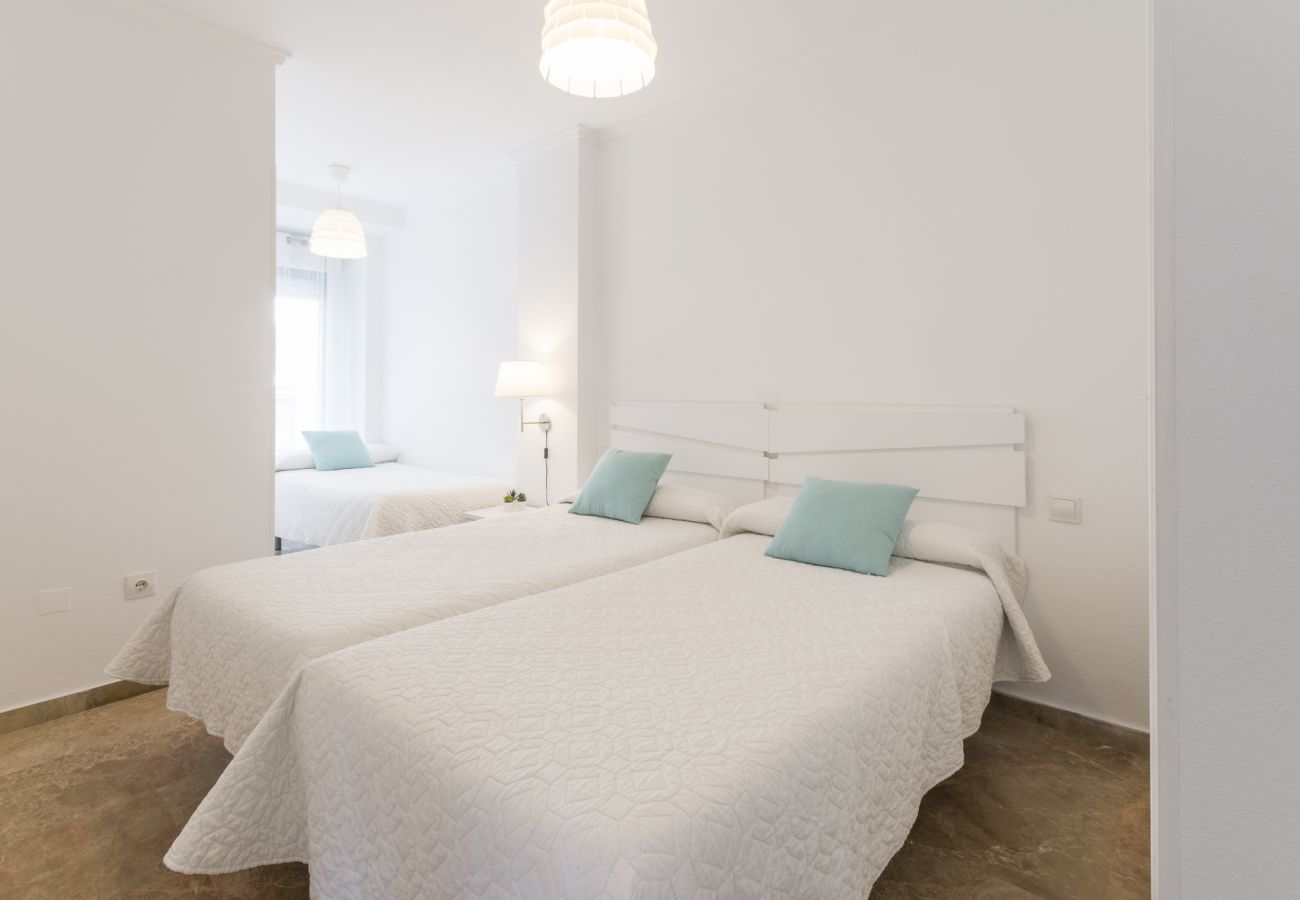 Apartment in Playa de Gandía - Amazing modern style condo, wifi free, interantional channels, heating swimming pool, children's area, BBQ Apartment in Playa de Gandía - Amazing modern style condo, wifi free, interantional channels, heating swimming pool, children's area, BBQ