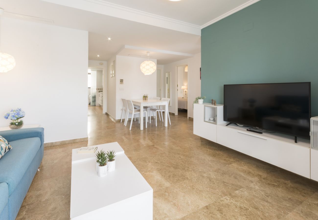 Apartment in Playa de Gandía - Amazing modern style condo, wifi free, interantional channels, heating swimming pool, children's area, BBQ Apartment in Playa de Gandía - Amazing modern style condo, wifi free, interantional channels, heating swimming pool, children's area, BBQ