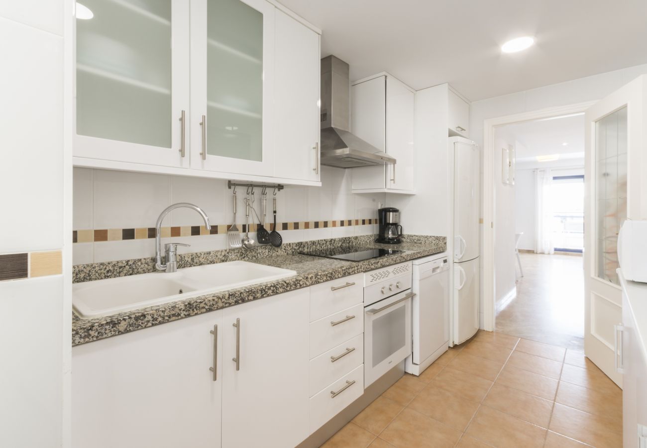 Apartment in Playa de Gandía - Amazing modern style condo, wifi free, interantional channels, heating swimming pool, children's area, BBQ Apartment in Playa de Gandía - Amazing modern style condo, wifi free, interantional channels, heating swimming pool, children's area, BBQ