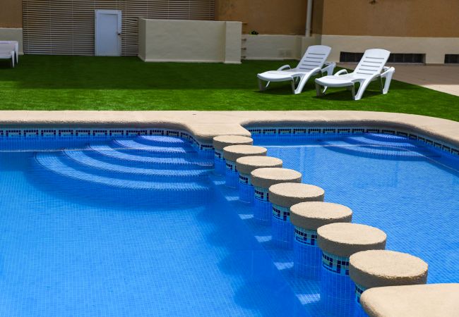 Apartment in Playa de Gandía - Cozy with mediterranean style, a few meters from the beach. A / C and free wifi. Terrace with sea views Apartment in Playa de Gandía - Cozy with mediterranean style, a few meters from the beach. A / C and free wifi. Terrace with sea views