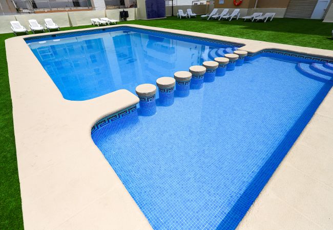 Apartment in Playa de Gandía - Cozy with mediterranean style, a few meters from the beach. A / C and free wifi. Terrace with sea views Apartment in Playa de Gandía - Cozy with mediterranean style, a few meters from the beach. A / C and free wifi. Terrace with sea views