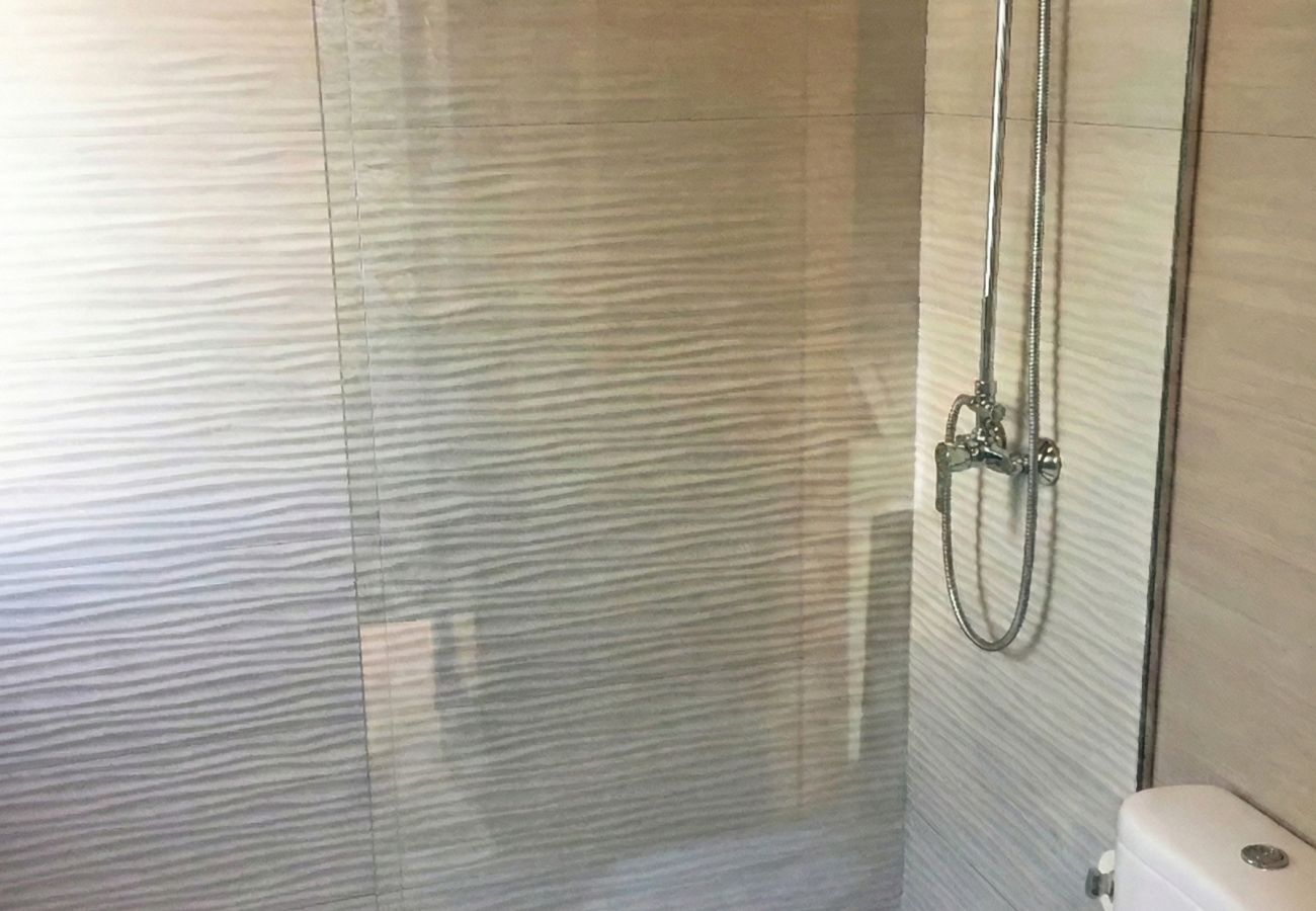 Glass shower screen in bathroom