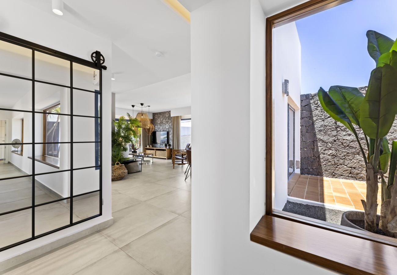 Spacious entrance hall with sliding doors