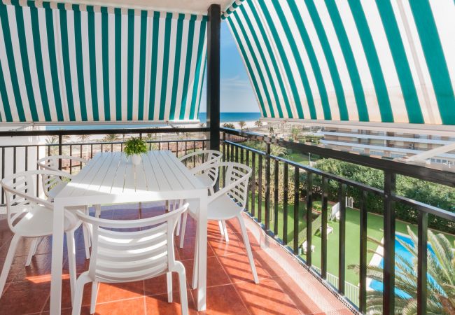 Apartment in Playa de Gandía - Condo in front of the Beach, Airco and lovely sunny terrace.  Apartment in Playa de Gandía - Condo in front of the Beach, Airco and lovely sunny terrace.
