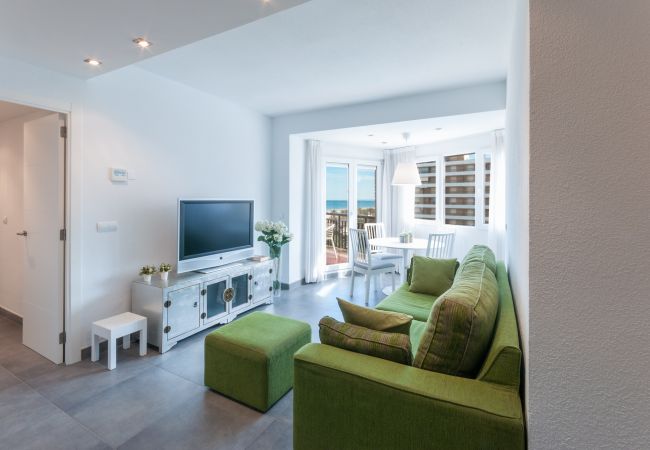 Apartment in Playa de Gandía - Condo in front of the Beach, Airco and lovely sunny terrace.  Apartment in Playa de Gandía - Condo in front of the Beach, Airco and lovely sunny terrace.