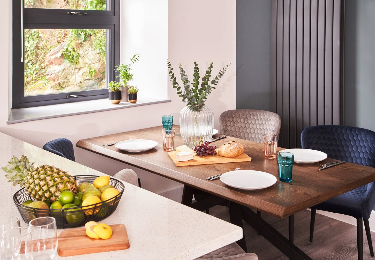 Contemporary kitchen and dining space in Torquay apartment