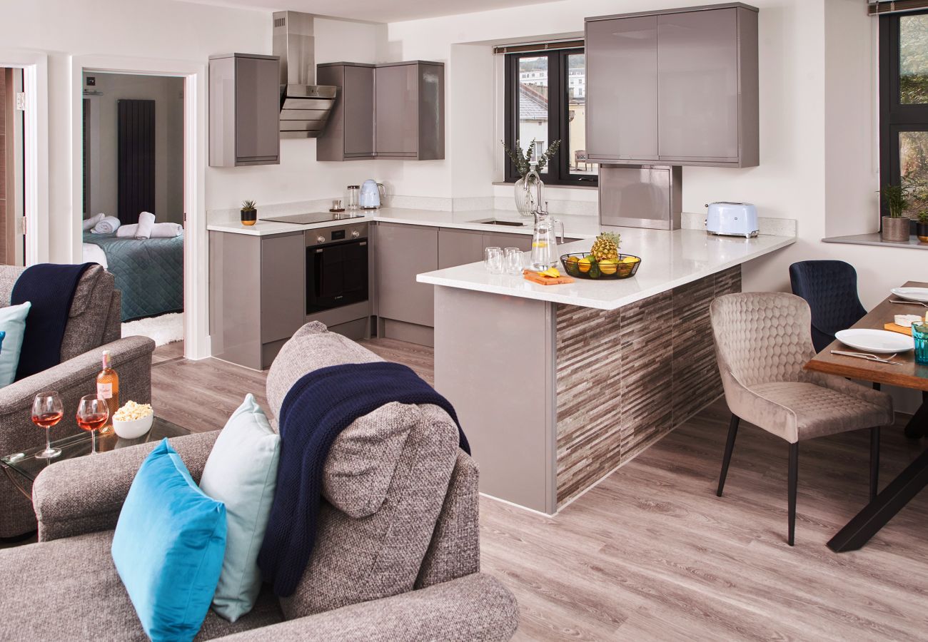 Open-plan living room in Torquay harbour apartment