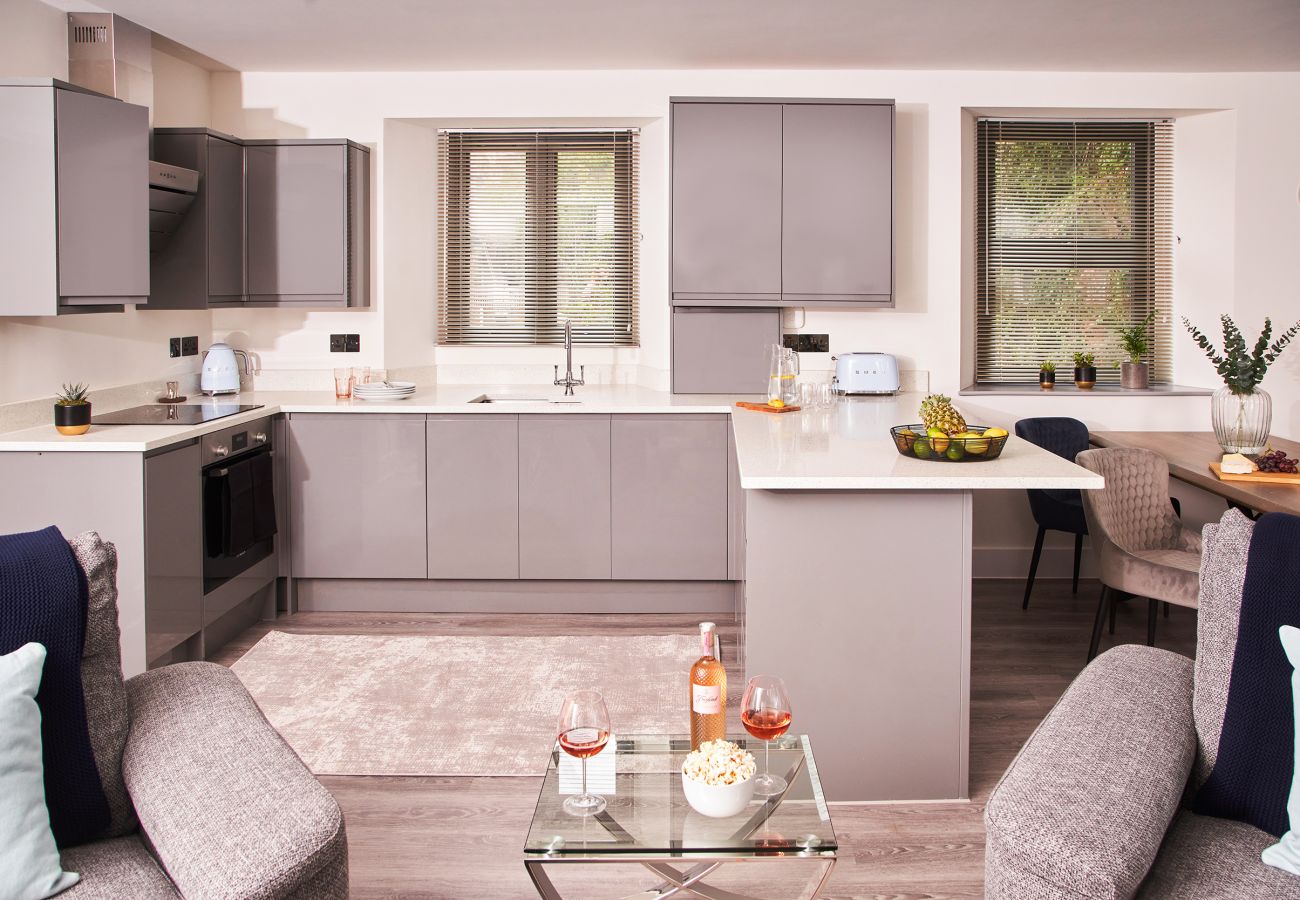 Contemporary kitchen and dining space in Torquay apartment