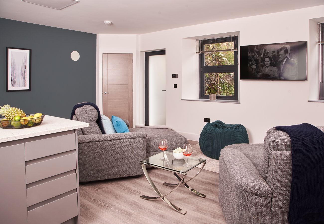 Contemporary kitchen and dining space in Torquay apartment