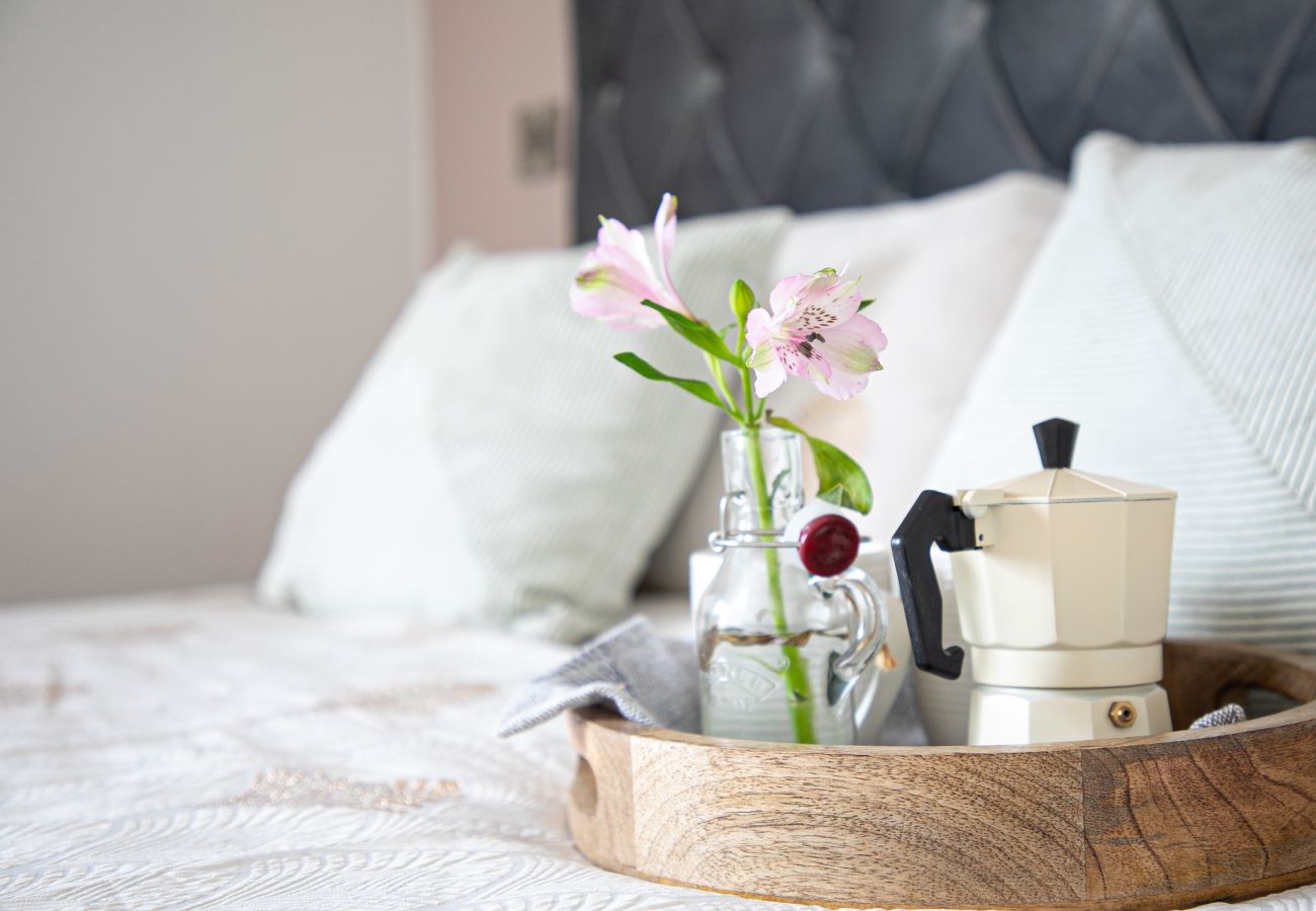 Second bedroom in Coombe Bank with double bed and calm coastal colours