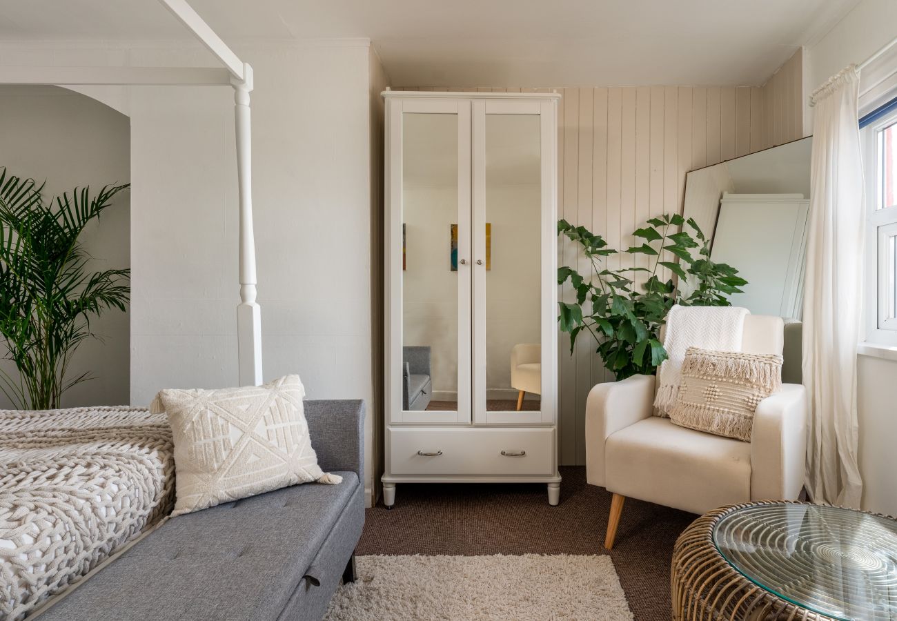 Double bedroom in The Crab Shack with windows facing Teignmouth estuary