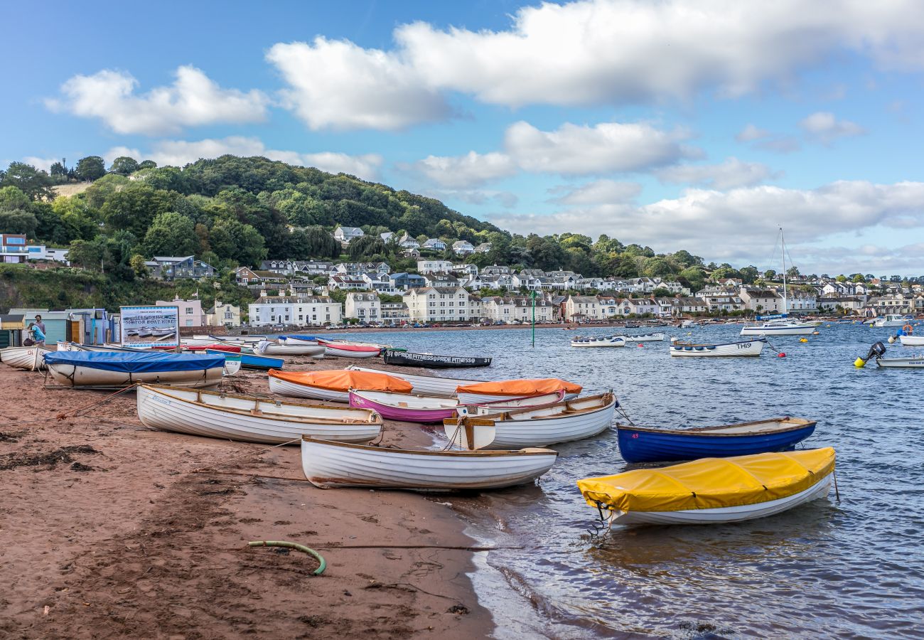 Walking path along the Teign Estuary with open water and countryside views close to Coombe Bank, Teignmouth