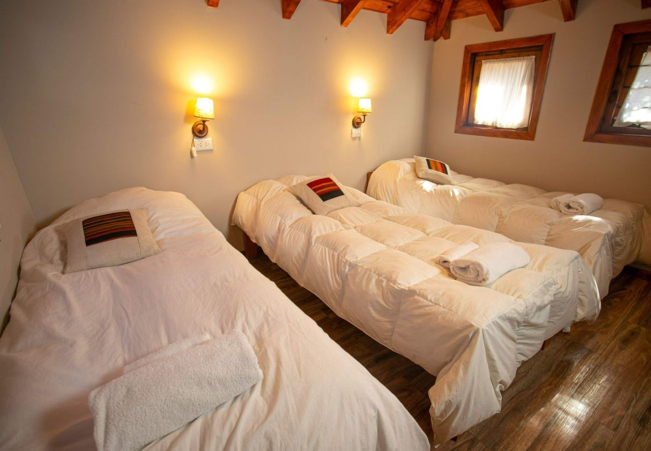 Cabin in San Carlos de Bariloche - HUAPI19C Warm cabin with large garden in front of Lake Nahuel Huapi Within a complex of 4 cabins.