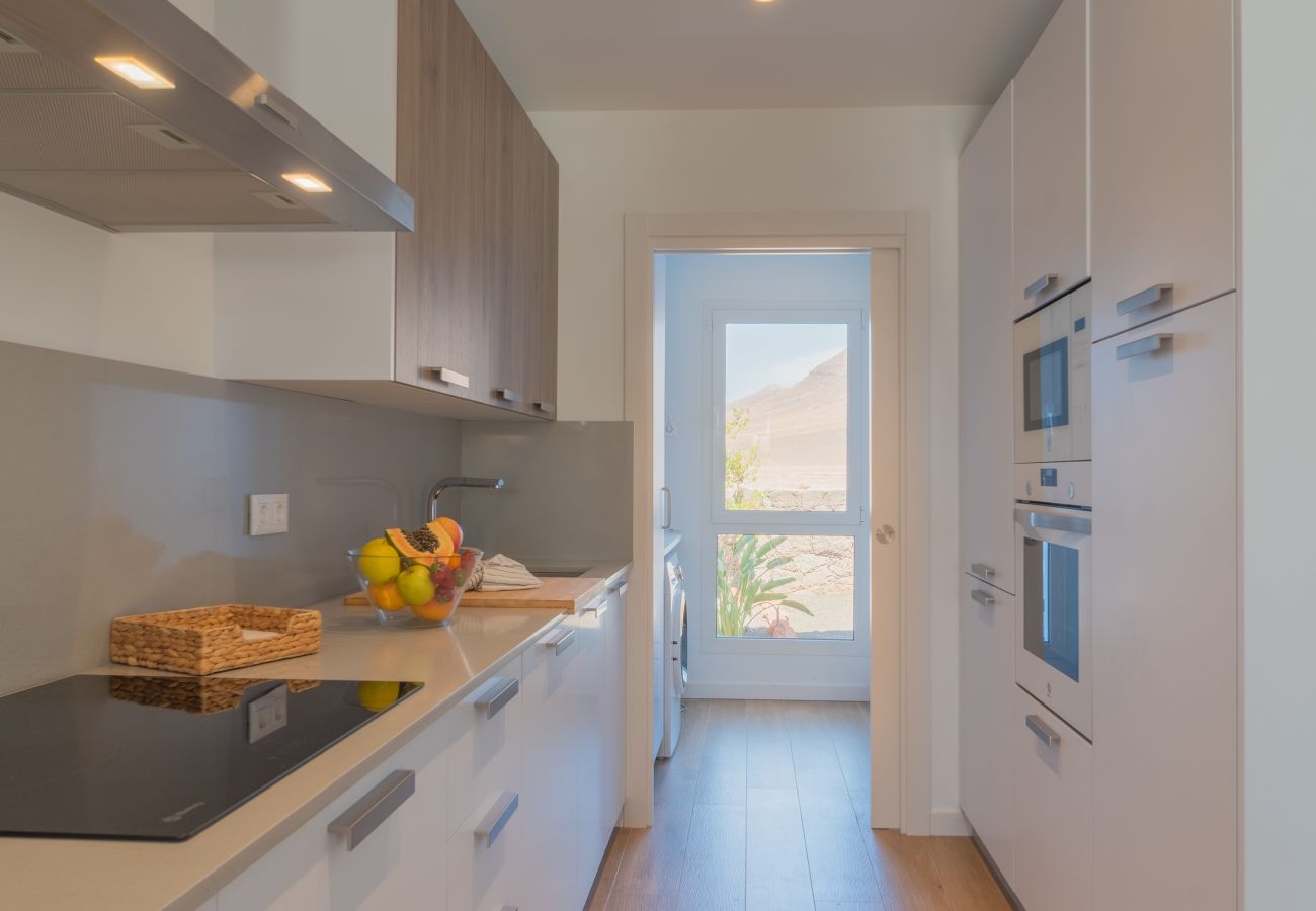 Villa in Playa Blanca - Serena Luca Ausgestattete amerikanische Küche.