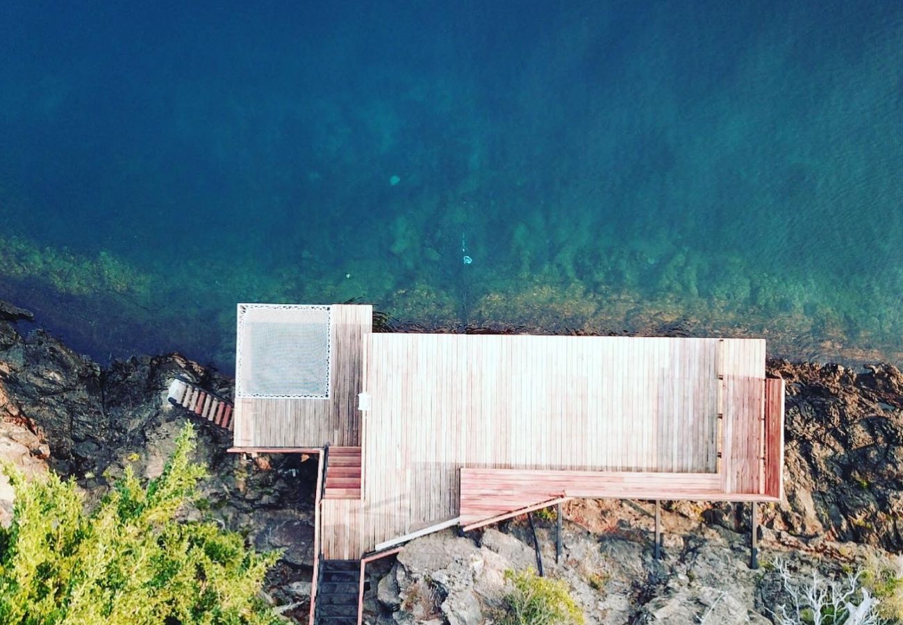 Casa a San Carlos de Bariloche - Peni14c Lindísima casa con increíble vista al Nahuel Huapi y deck sobre el lago.
