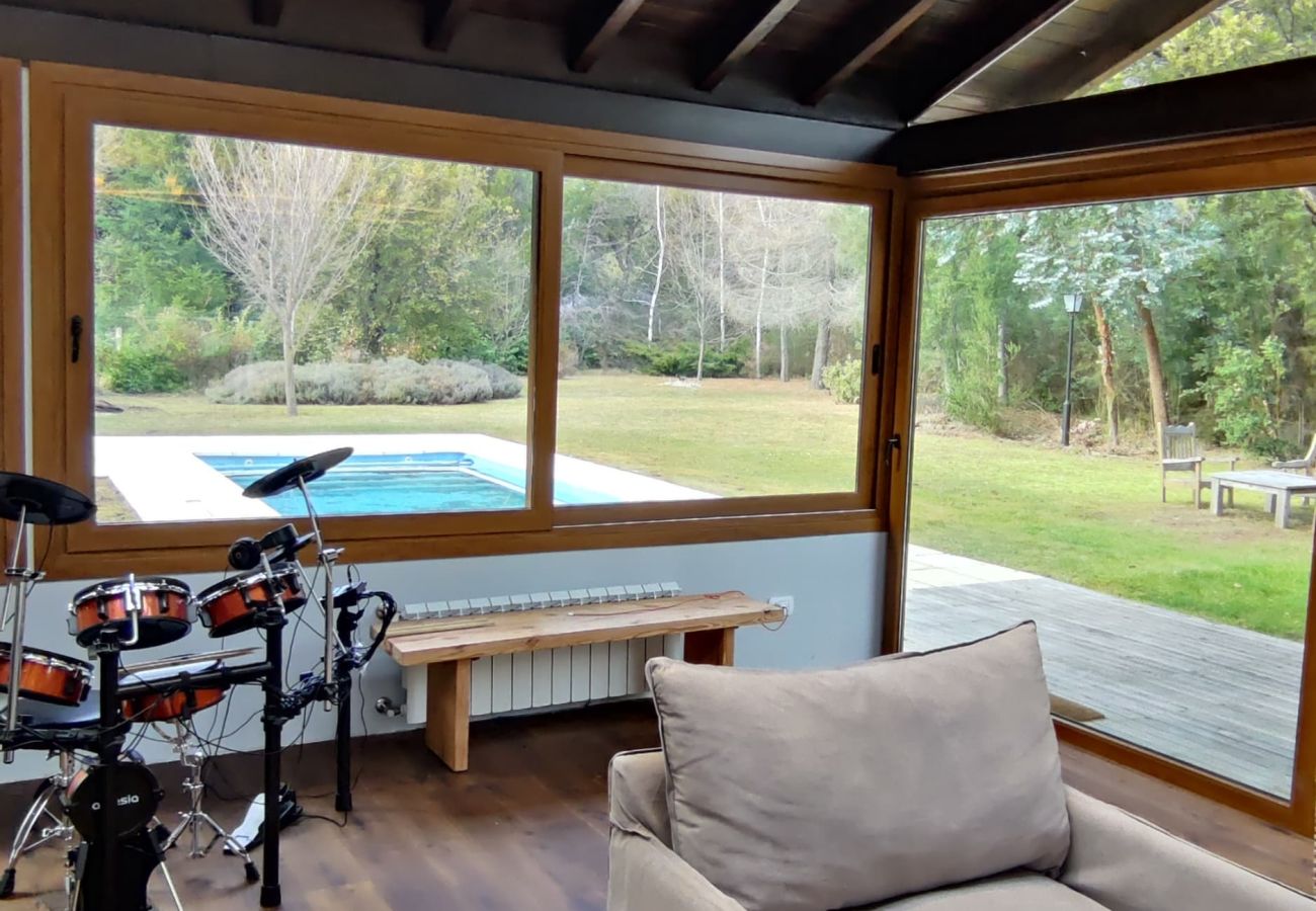 Casa a San Carlos de Bariloche - ARE55 ESPECTACULAR CASA CON QUINCHO INTEGRADO Y PILETA CLIMATIZADA